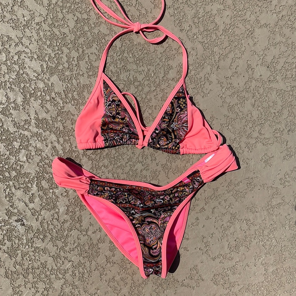 Bikini - cheeky style bottoms - Worn only once. Made by DOLL Swimwear. Size: L